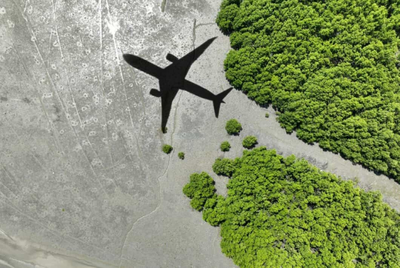 WORLD'S FIRST GREEN FUEL TAX HITS PLANE TICKET PRICES